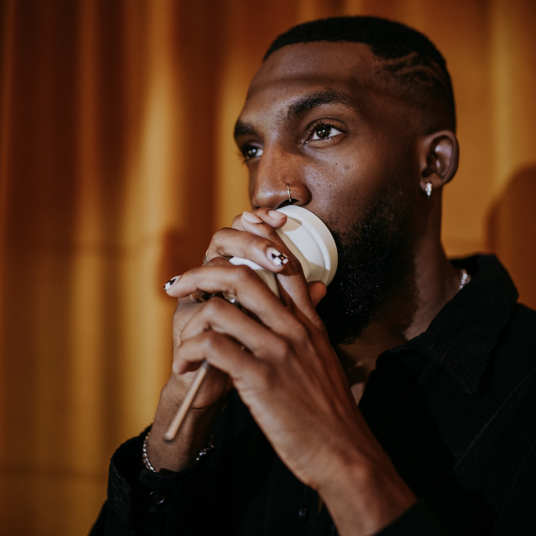 Singer using VoiceStraw and Cup